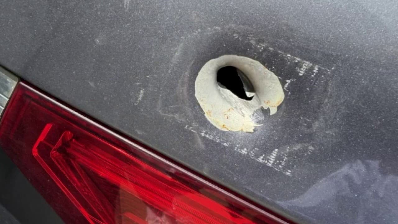 Minivan struck by gunfire near busy Newnan shopping center