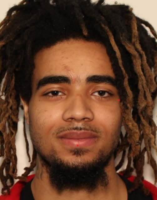 Suspect wanted after man found dead in Hampton wooded area